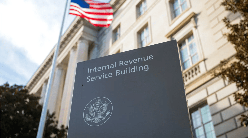 IRS building and sign with US flag